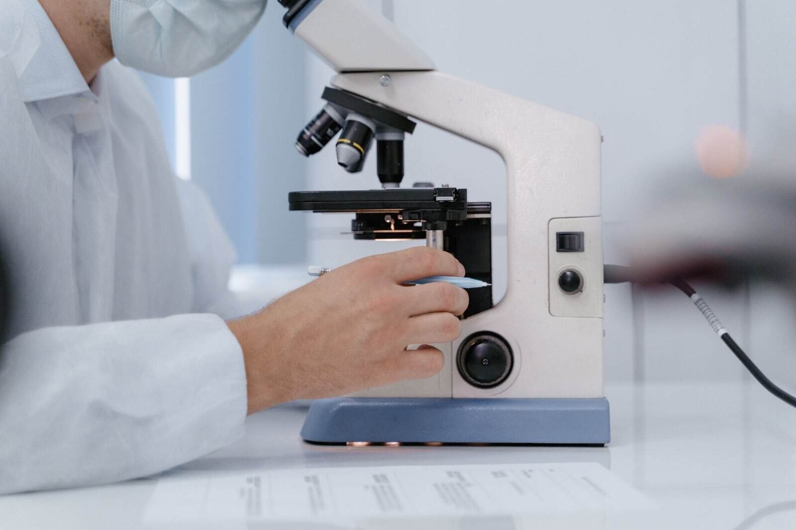 Laboratory research bench with glassware used in reconstitution solution research